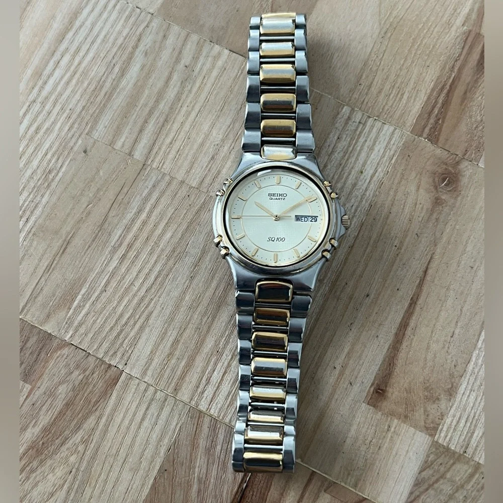 Seiko SQ 100 Rare Vintage Men’s Watch Light Gold-Tone Dial Two-Tone Bracelet